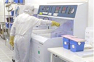 man working on manual semiconductor benches